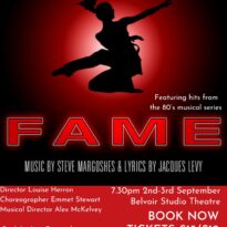 The shadow of a dancer leaping against a red background.